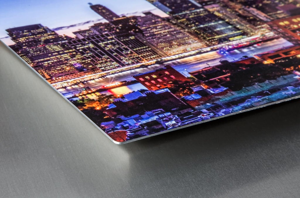 Up close photograph of a photo on metal shows the vibrancy and clarity of this printing style.